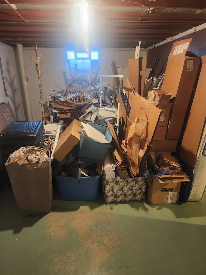 Roll-off dumpster container at job site for 6 Yard Dumpster Rental in Bennett